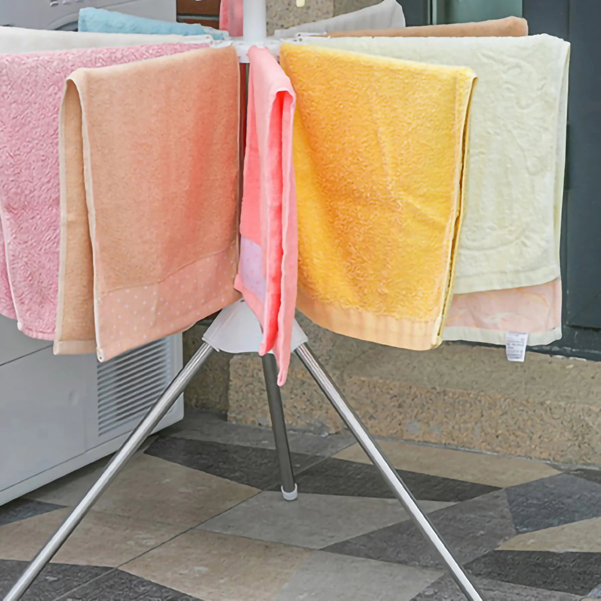 360° Rotating Clothes Drying Rack – Foldable Stainless Steel Laundry Rack with Strong Load-Bearing Capacity.