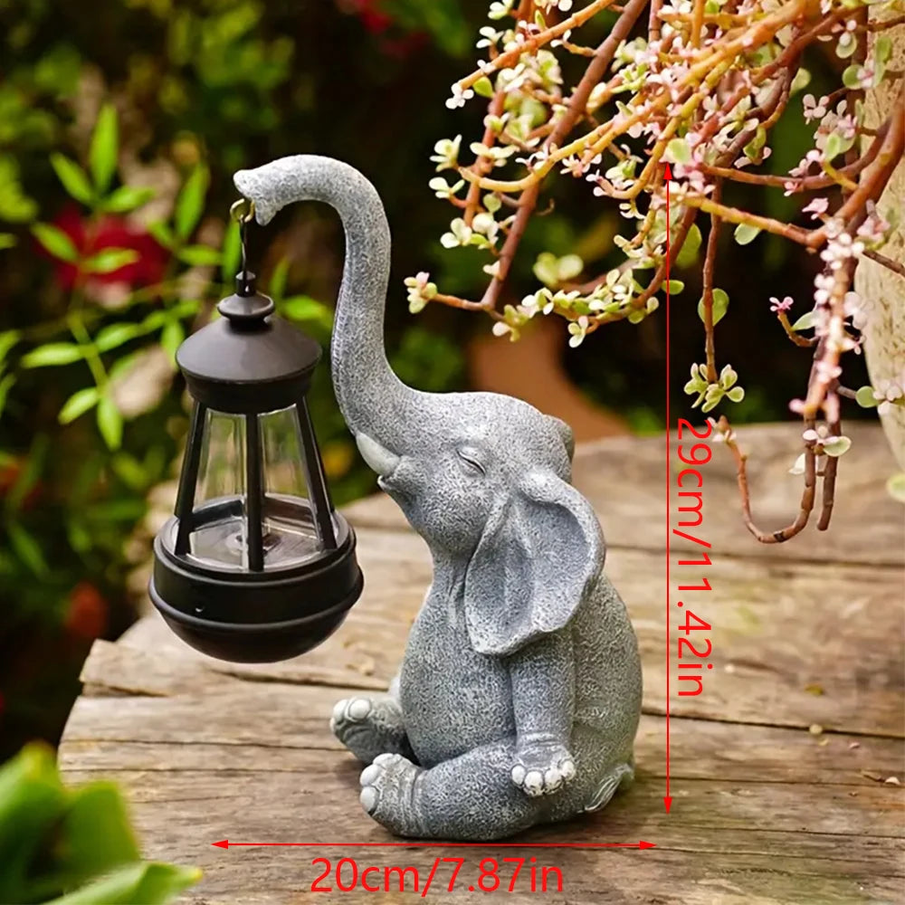 Solar Elephant Garden Statue – Resin Elephant Figurine with Lantern Light.